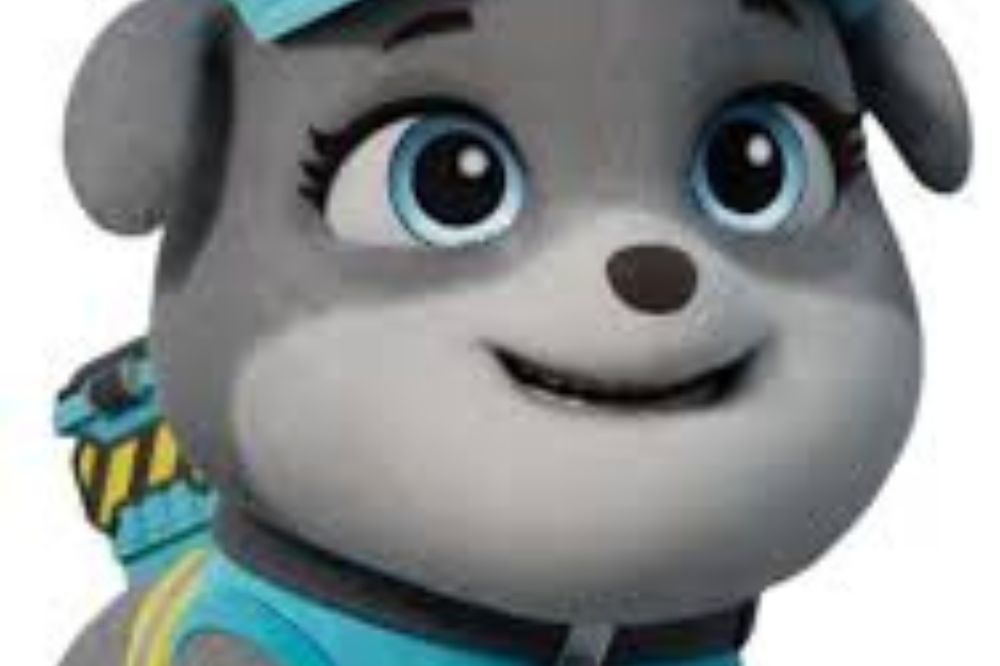 Personnage animé canin gris portant un uniforme turquoise et un sac à dos, dans un style 3D coloré pour enfants.